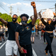 People march through the streets after the verdict was announced for Derek Chauvin on April 20, 2021 in Atlanta, United States. Former police officer Derek Chauvin was on trial on second-degree murder, third-degree murder and second-degree manslaughter charges in the death of George Floyd May 25, 2020. After video was released of then-officer Chauvin kneeling on Floyd’s neck for nine minutes and twenty-nine seconds, protests broke out across the U.S. and around the world. The jury found Chauvin guilty on all three charges.